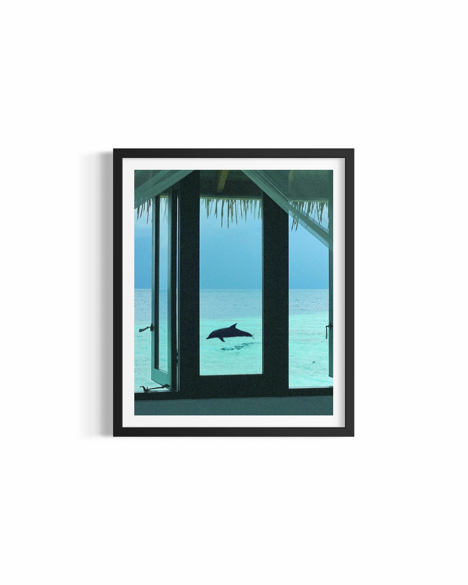 Dolphin in turquoise Indian Ocean framed through overwater villa window at Maldives — Window to Heaven by Saxon Kent