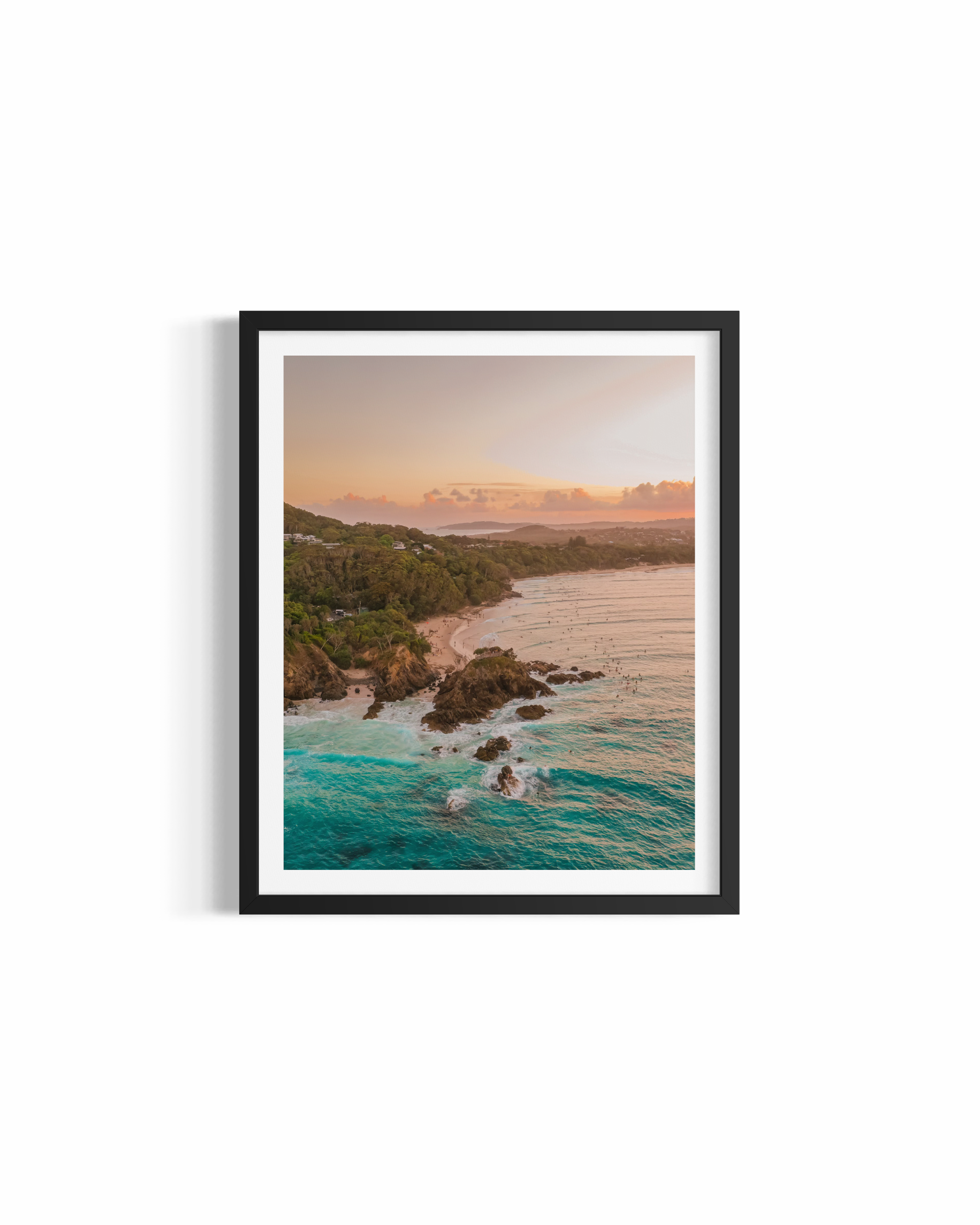 Aerial view of The Pass Byron Bay bathed in warm golden sunset light — A Classic fine art print by Saxon Kent