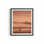 Three surfers silhouetted at golden hour at The Pass Byron Bay — Different Perspectives fine art print by Saxon Kent