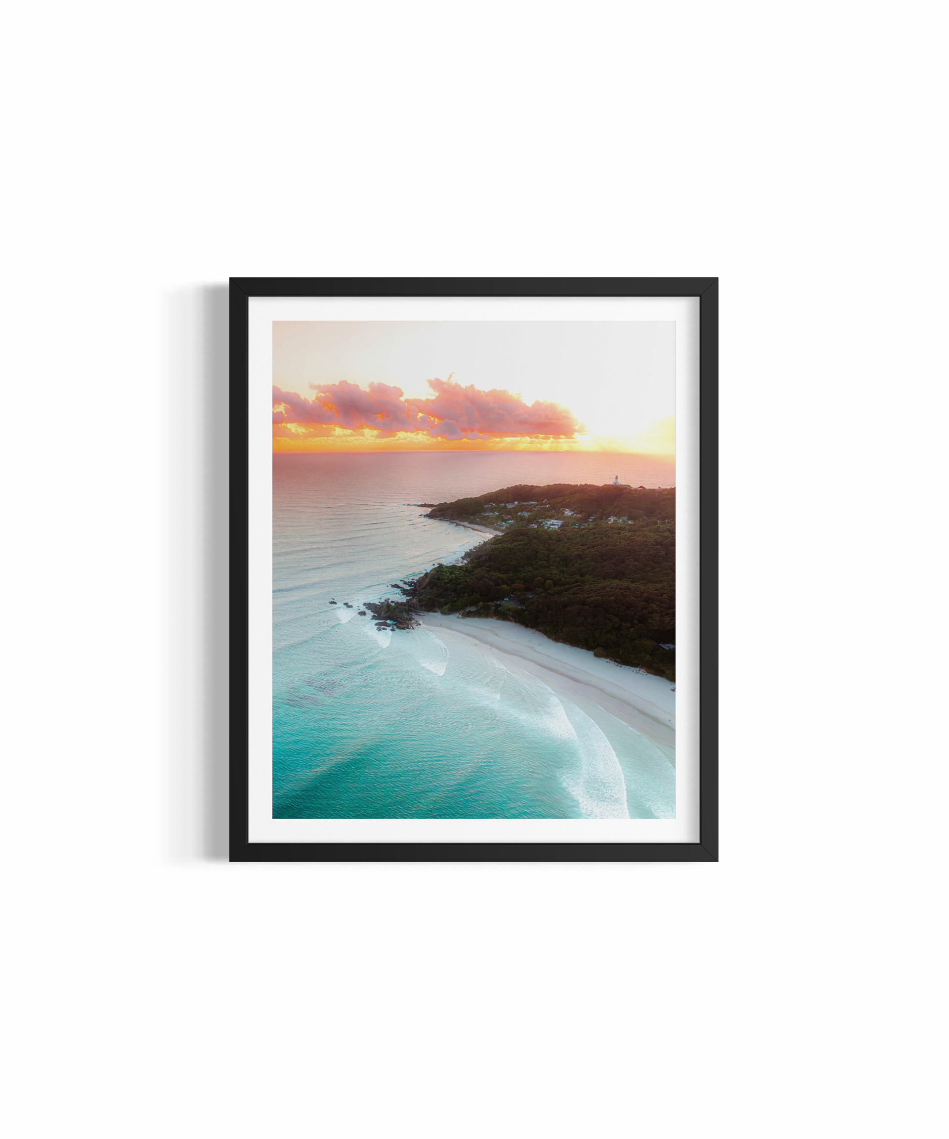 Aerial view of The Pass Byron Bay at pastel sunrise with Cape Byron Lighthouse in the distance — Pastels From the Pass by Saxon Kent