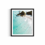 Aerial view looking down on The Pass Byron Bay with turquoise water, surfers and rocky headland — Down the Line by Saxon Kent
