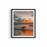 Lone surfer with longboard beneath crescent moon at sunset, Wategos Beach — In My Mind print by Saxon Kent