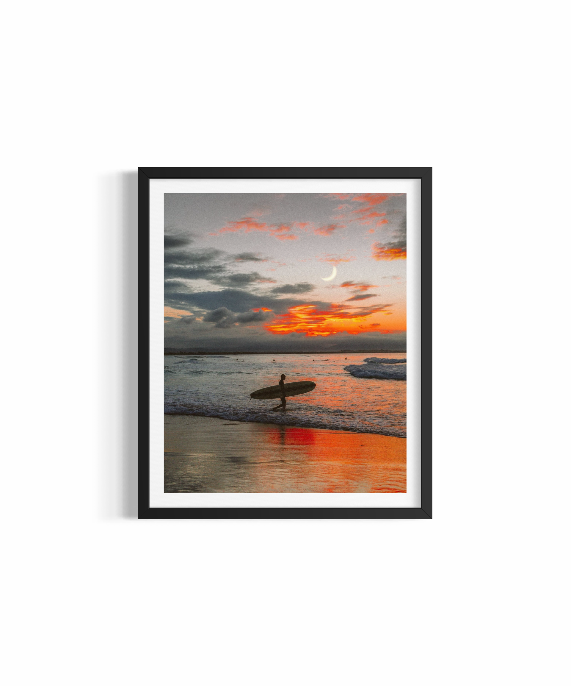 Lone surfer with longboard beneath crescent moon at sunset, Wategos Beach — In My Mind print by Saxon Kent