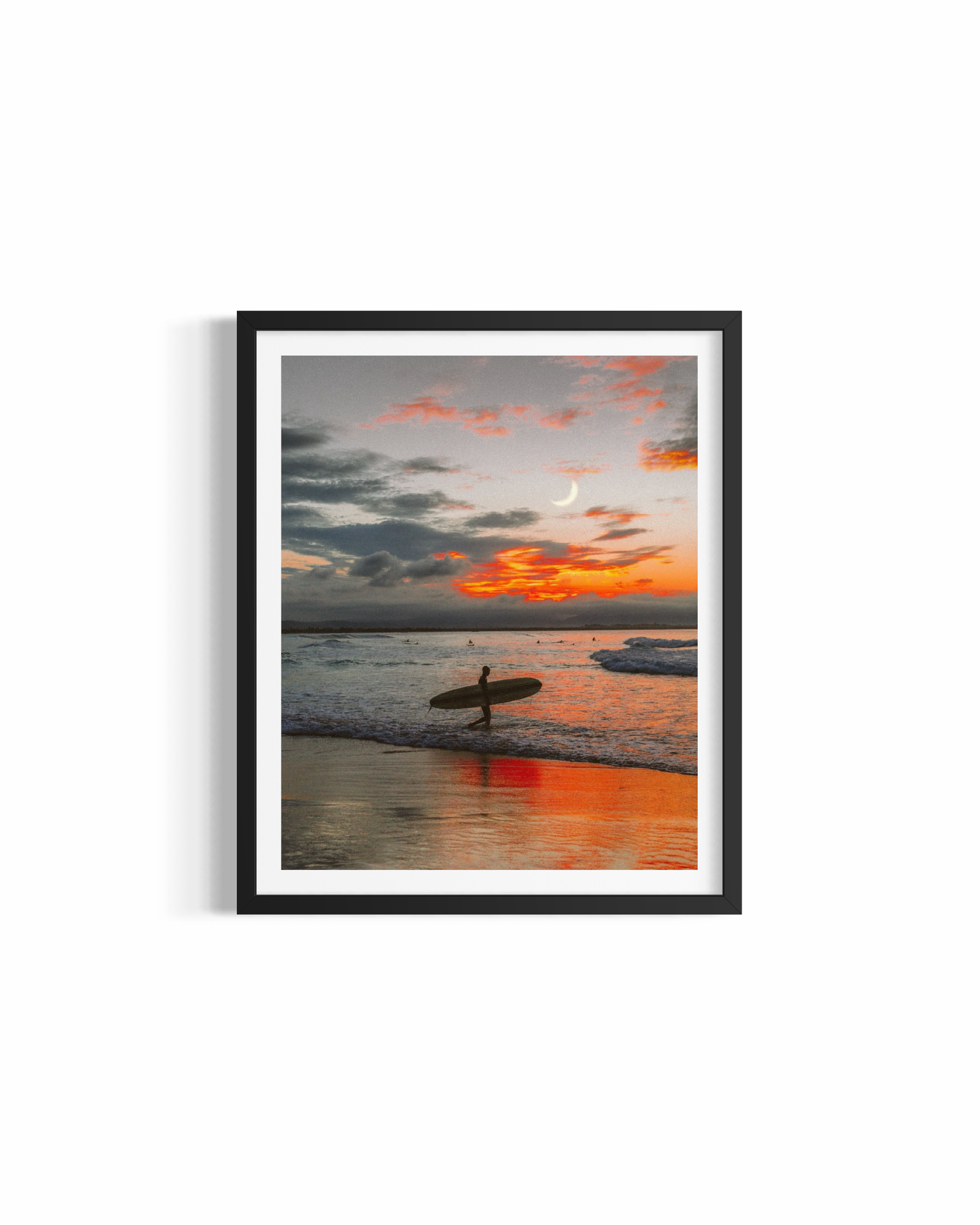 Lone surfer with longboard beneath crescent moon at sunset, Wategos Beach — In My Mind print by Saxon Kent