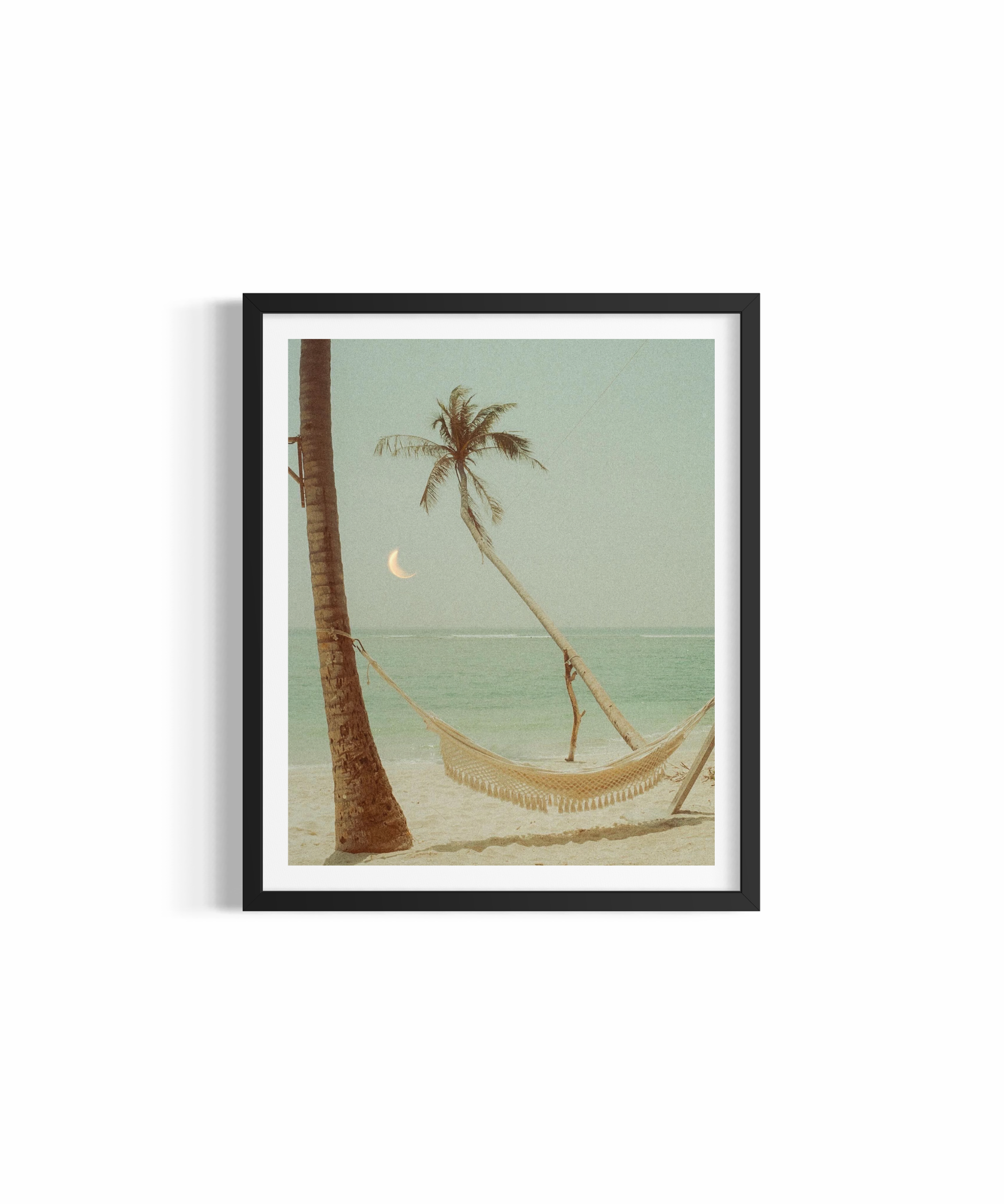 Crescent moon over palm-fringed turquoise water with hammock at golden hour in the Maldives — Coco Dream by Saxon Kent