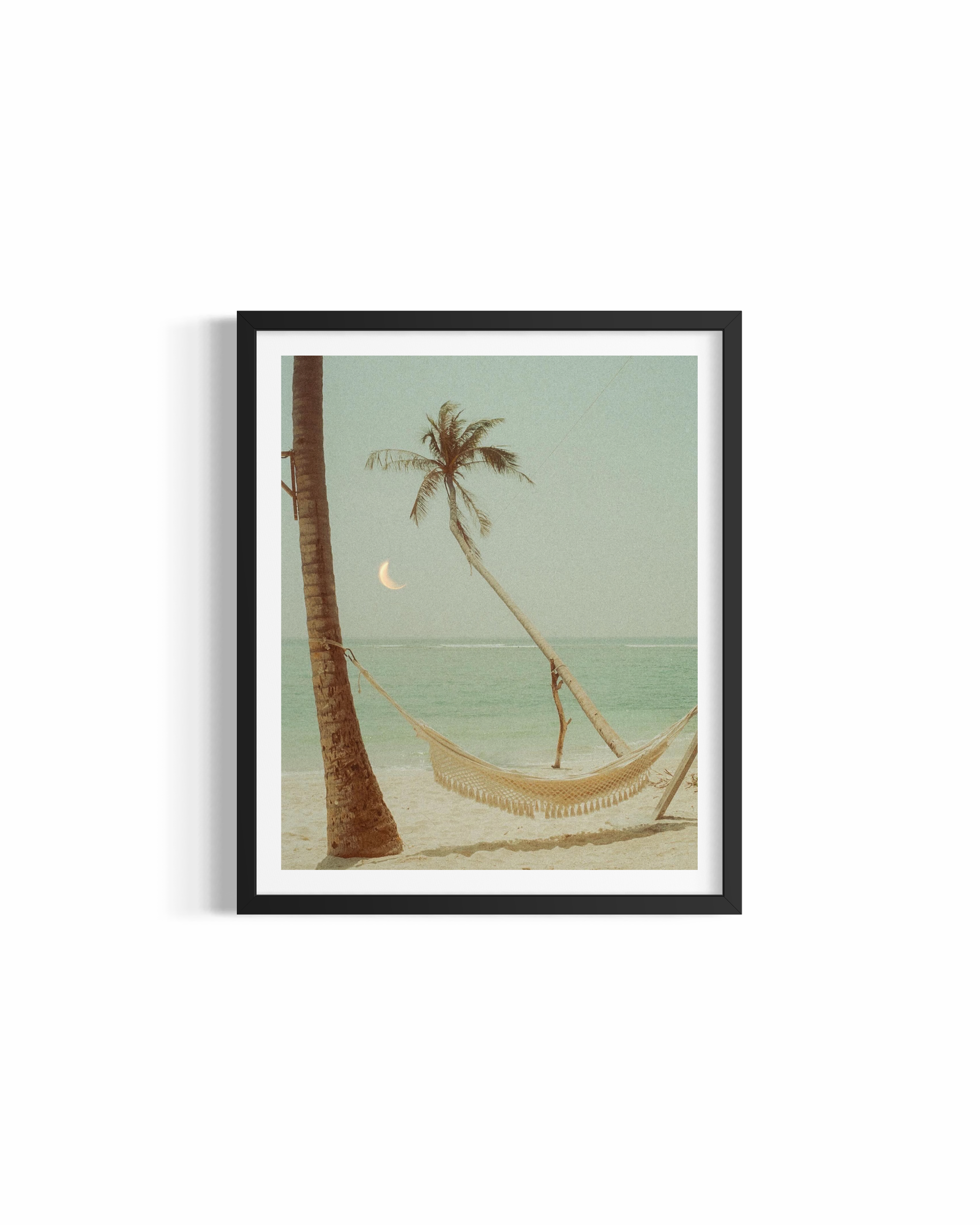 Crescent moon over palm-fringed turquoise water with hammock at golden hour in the Maldives — Coco Dream by Saxon Kent
